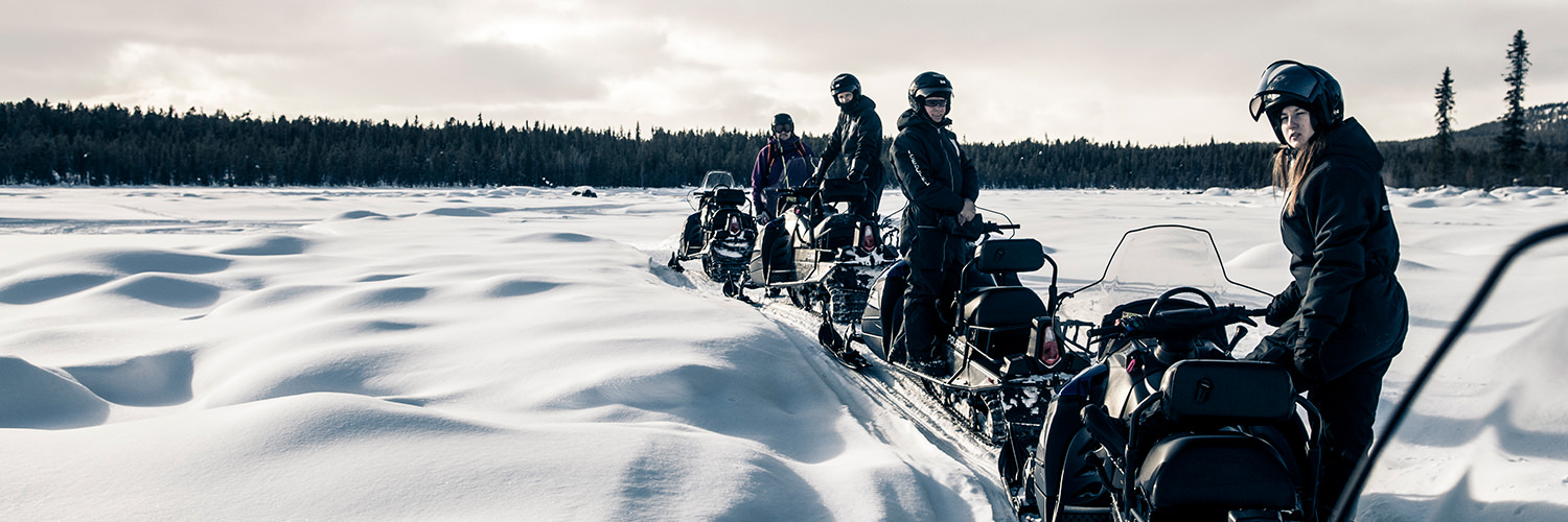 Snowmobilers on the lake.